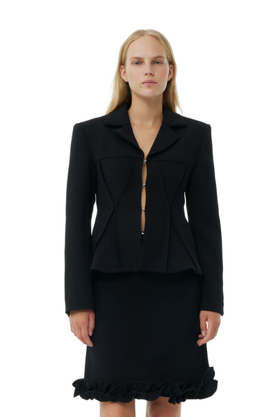 Model wearing Ganni Bonded Crepe Fitted Blazer front view