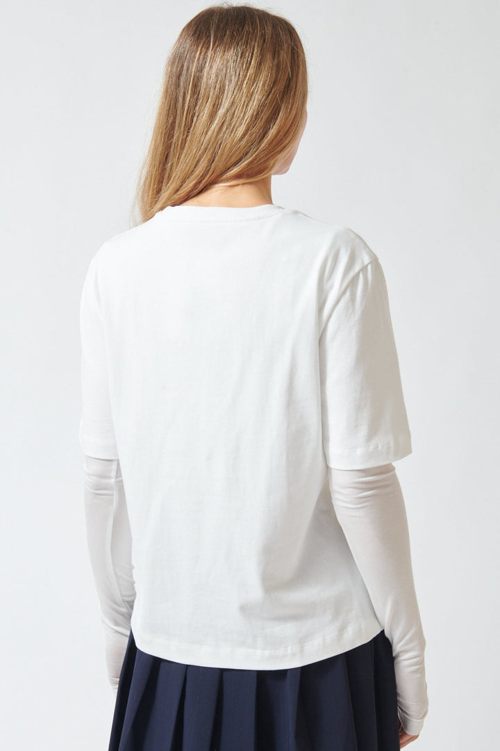 Mari wearing ELEH Long Short Layered Thumb Tee rear view