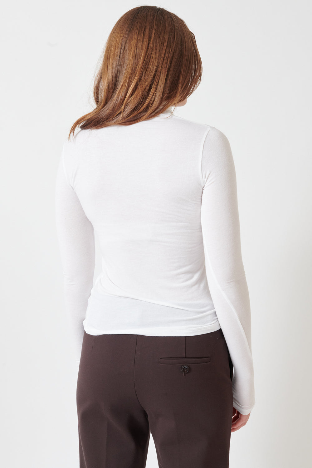 Julia wearing Dorothee Schumacher Chic Comfort Shirt rear view