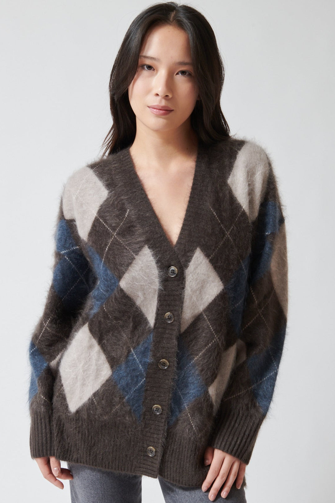 Lilly wearing Lisa Yang Elaria Cardigan front view