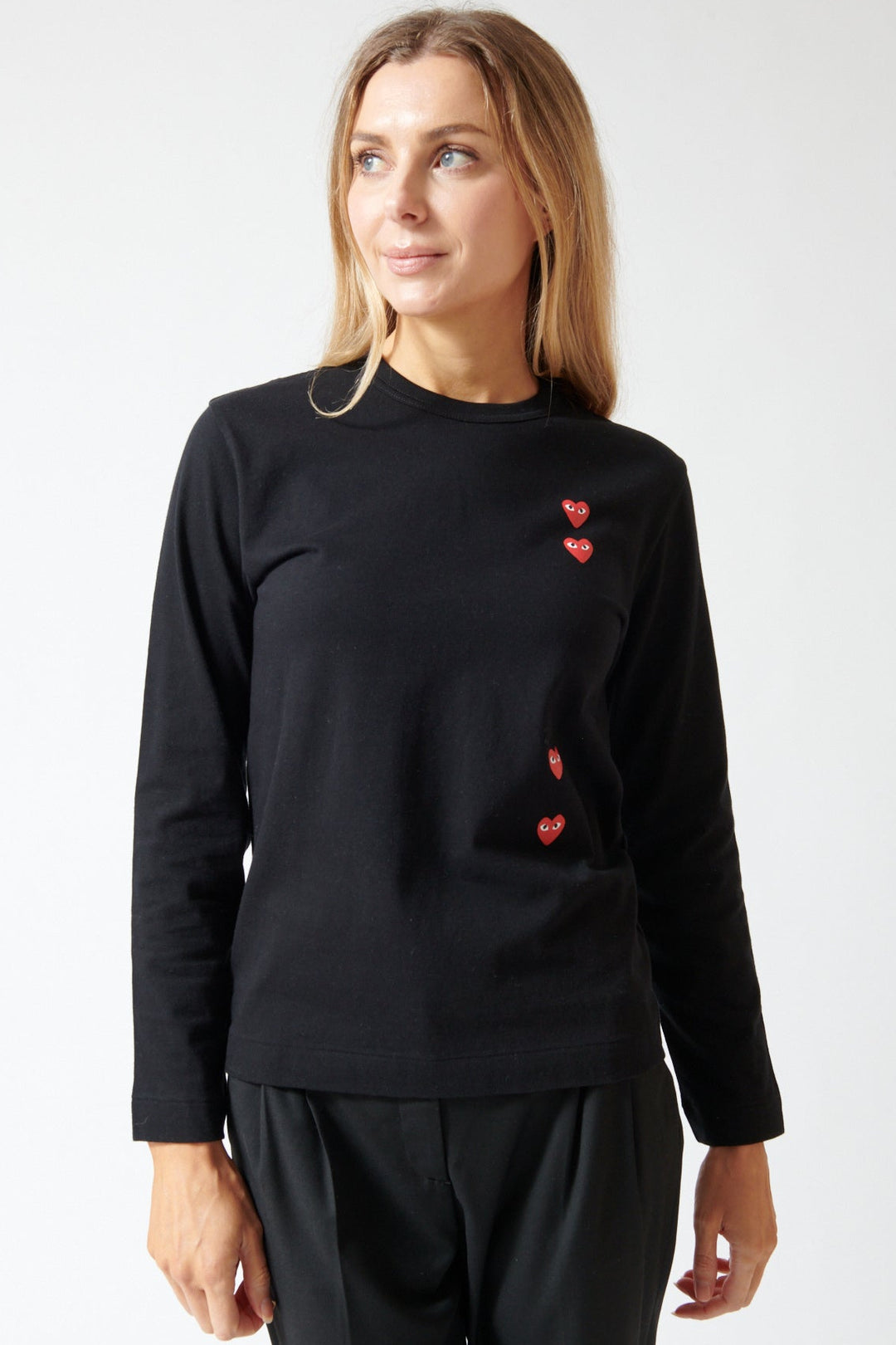 Mari wearing Comme des Garçons PLAY Duo Pair Heart Logo Print Long Sleeve T-Shirt front view