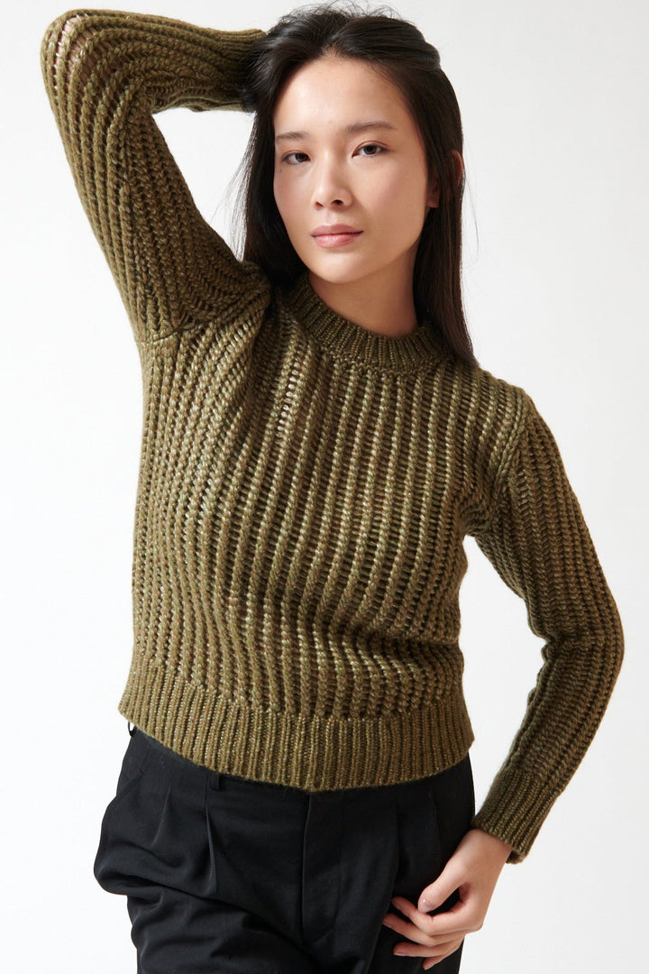 Lilly wearing Peserico Wet Look Merino Wool And Alpaca Chunky Yarn Knitted Sweater front view