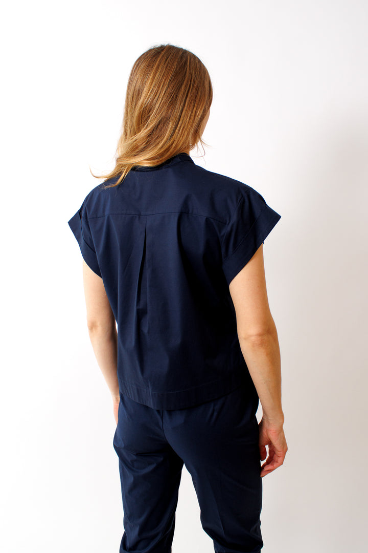 Mari wearing Rosso 35 Cotton Cap Sleeve Top rear view