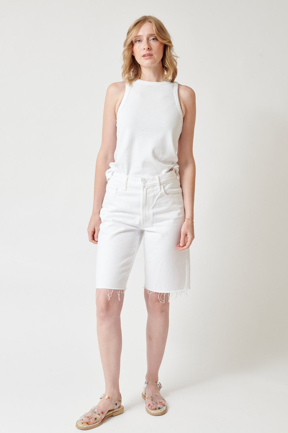 Madi wearing Mother Denim The Maven Bermuda Fray