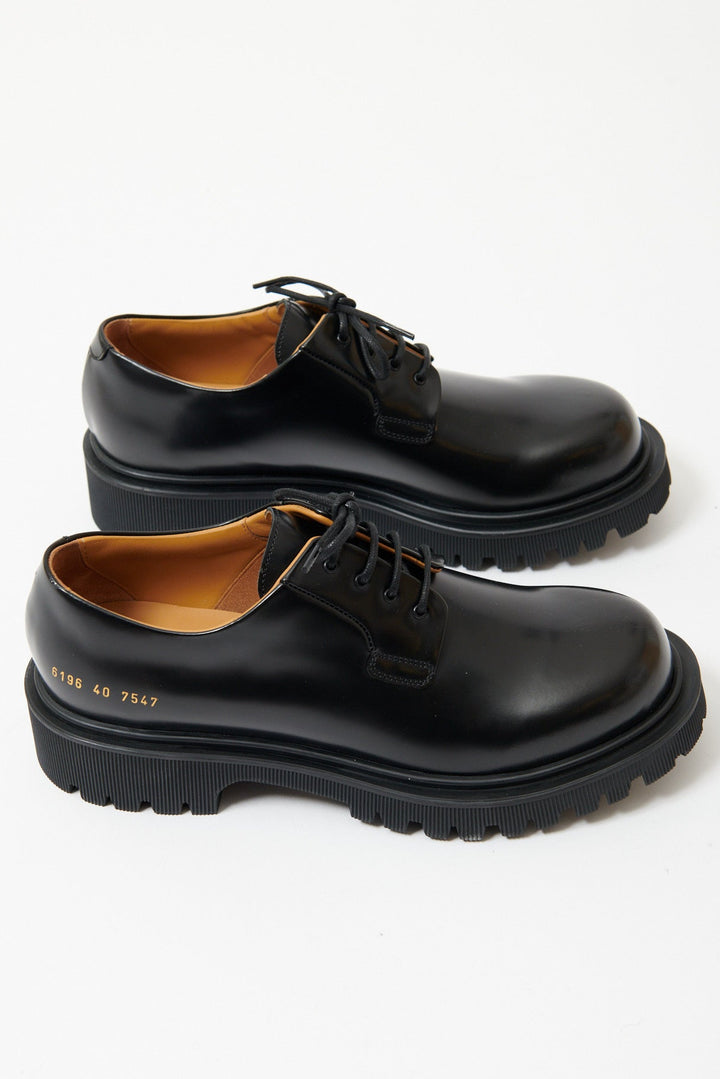 Flat lay of Common Projects Chunky Derby side view