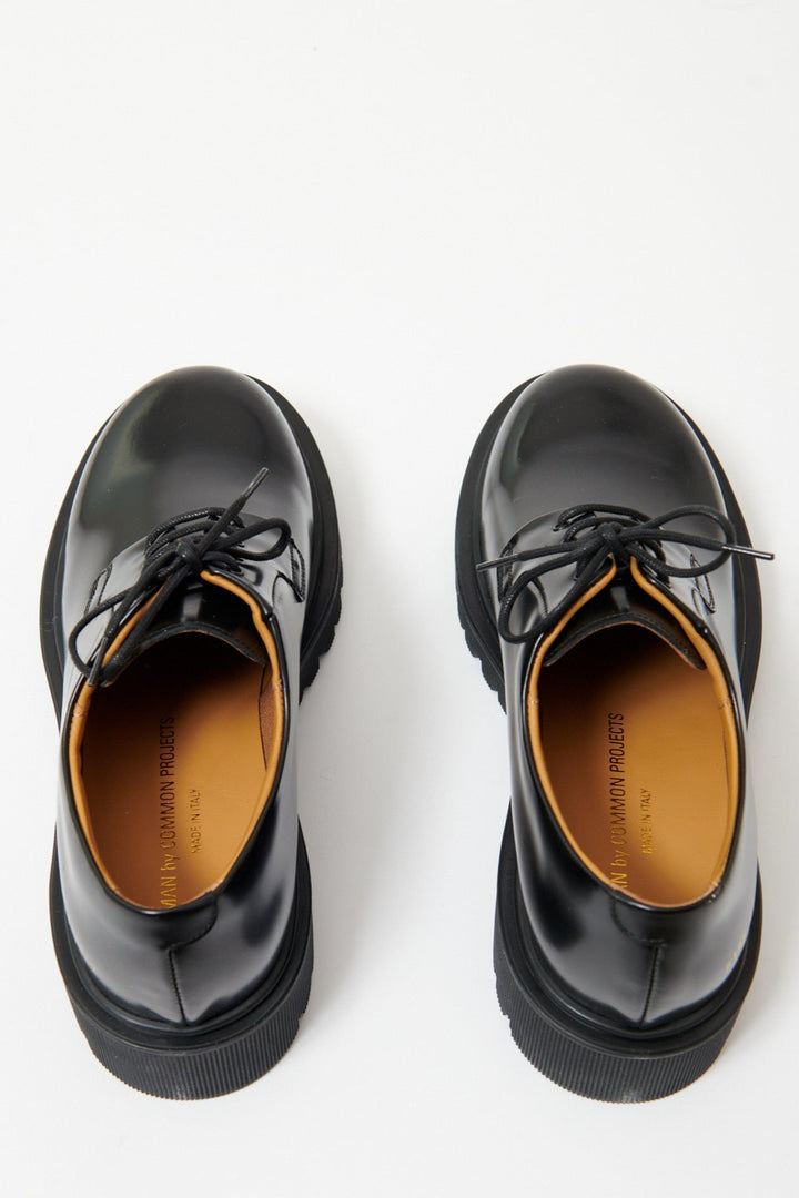 Flat lay of Common Projects Chunky Derby rear view