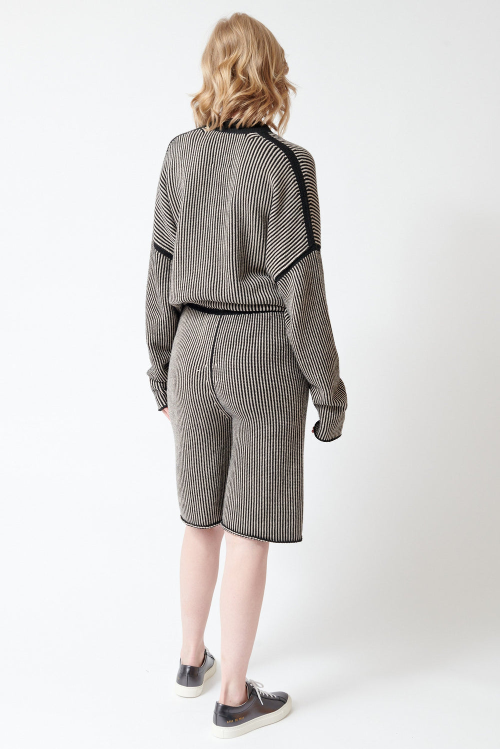 Madi wearing Lauren Manoogian Linea Shorts rear view