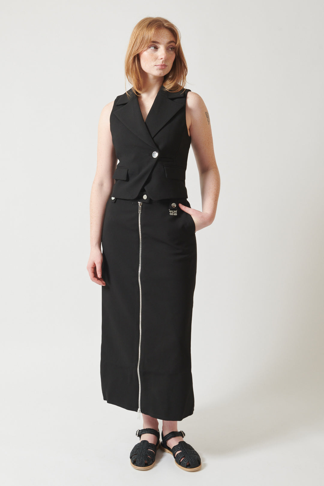Waverly wearing Ganni Bonded Crepe Long Skirt front view