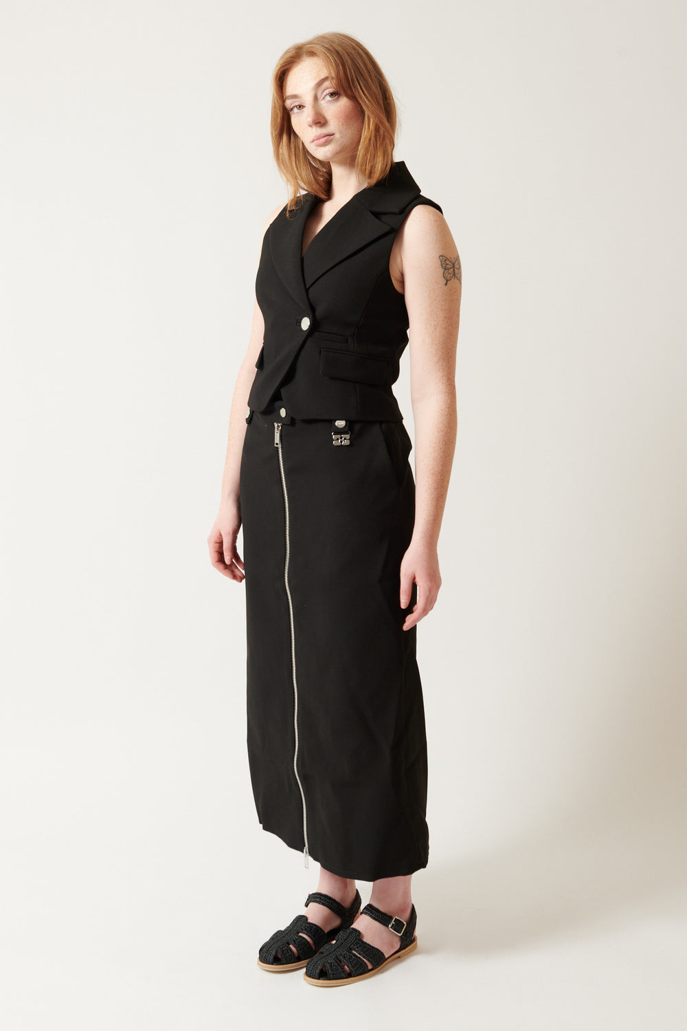Waverly wearing Ganni Bonded Crepe Long Skirt front view