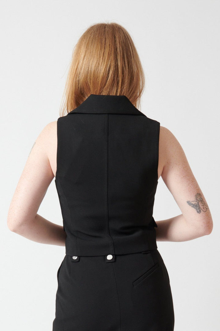 Waverly wearing Ganni Bonded Crepe Vest rear view