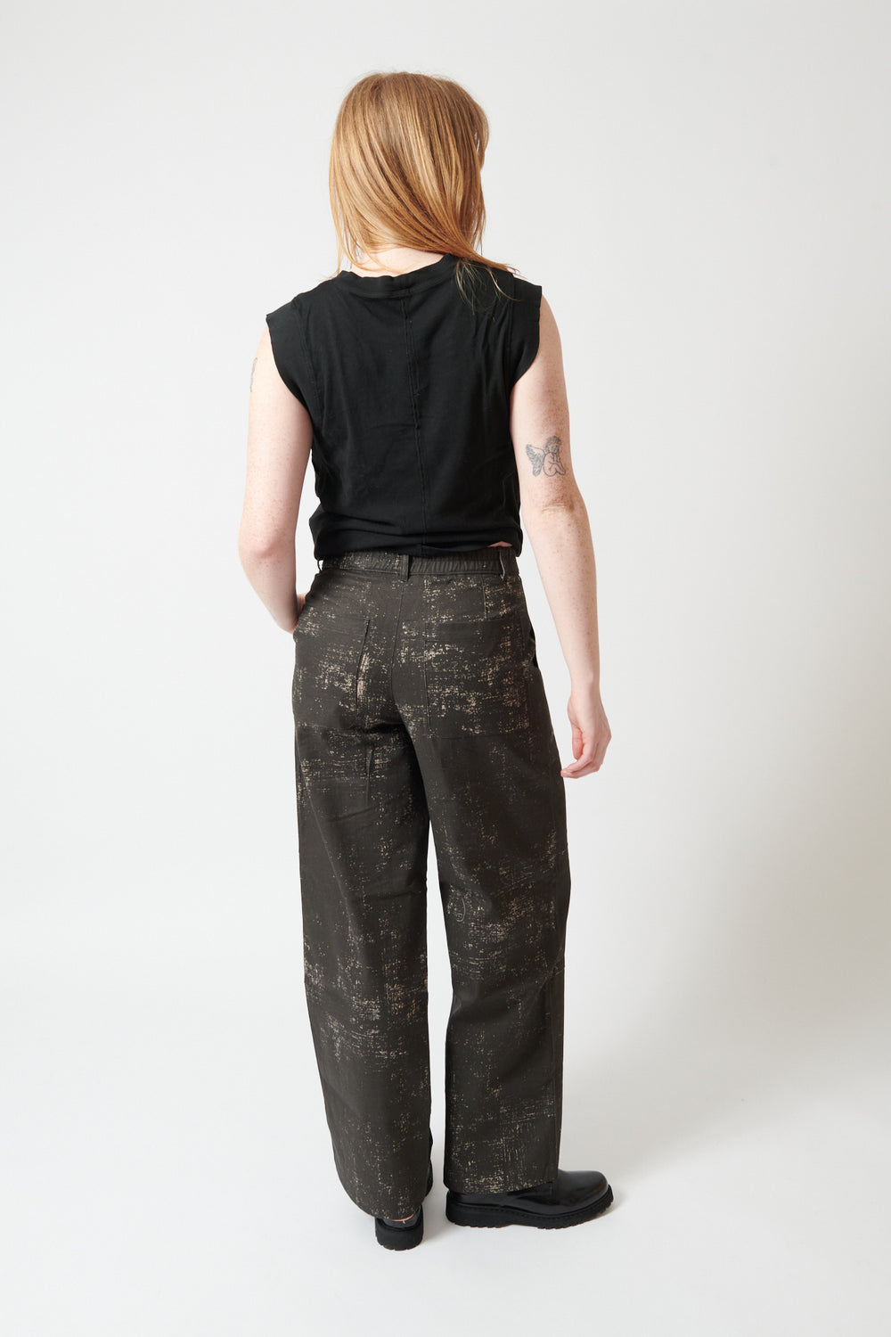 Waverly wearing Raquel Allegra Arden Trousers rear view