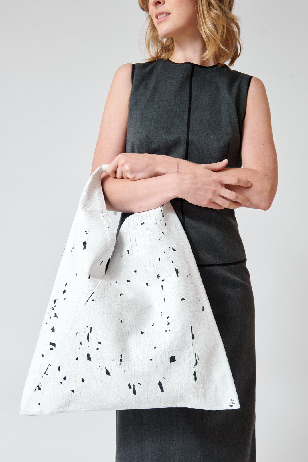 Madi holding MM6 Maison Margiela Large Character Bag front view