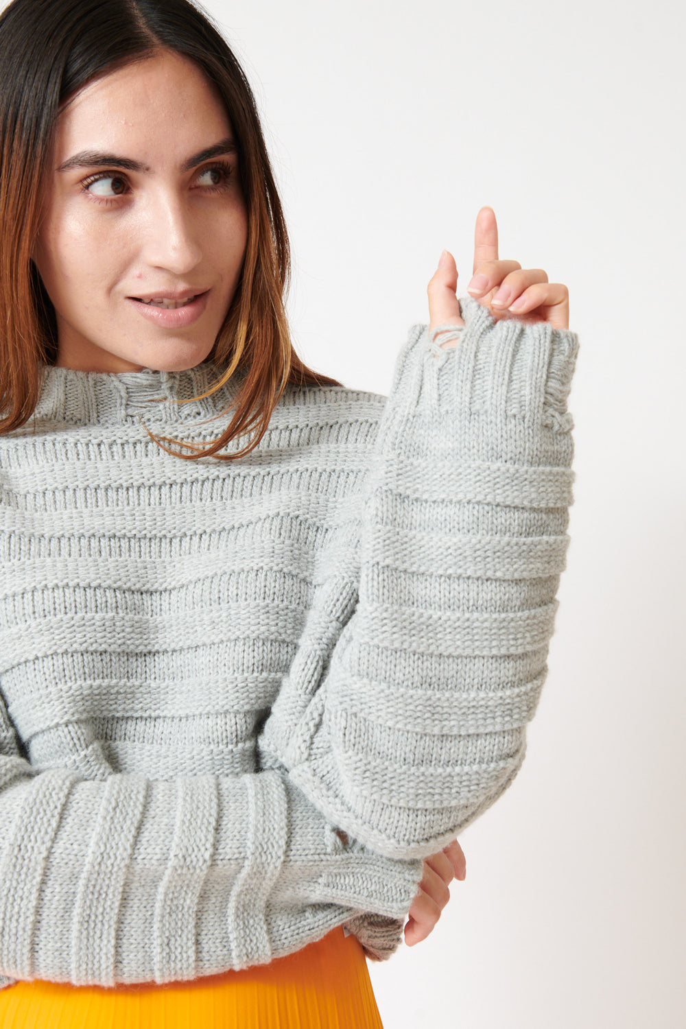 Maria wearing MM6 Maison Margiela Distressed Horizontal Links Crop Sweater front/detail view