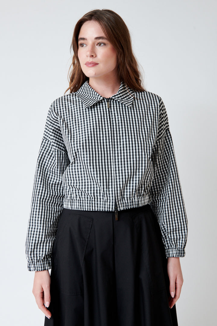 Julia wearing SFIZIO Cropped Gingham Windbreaker front view