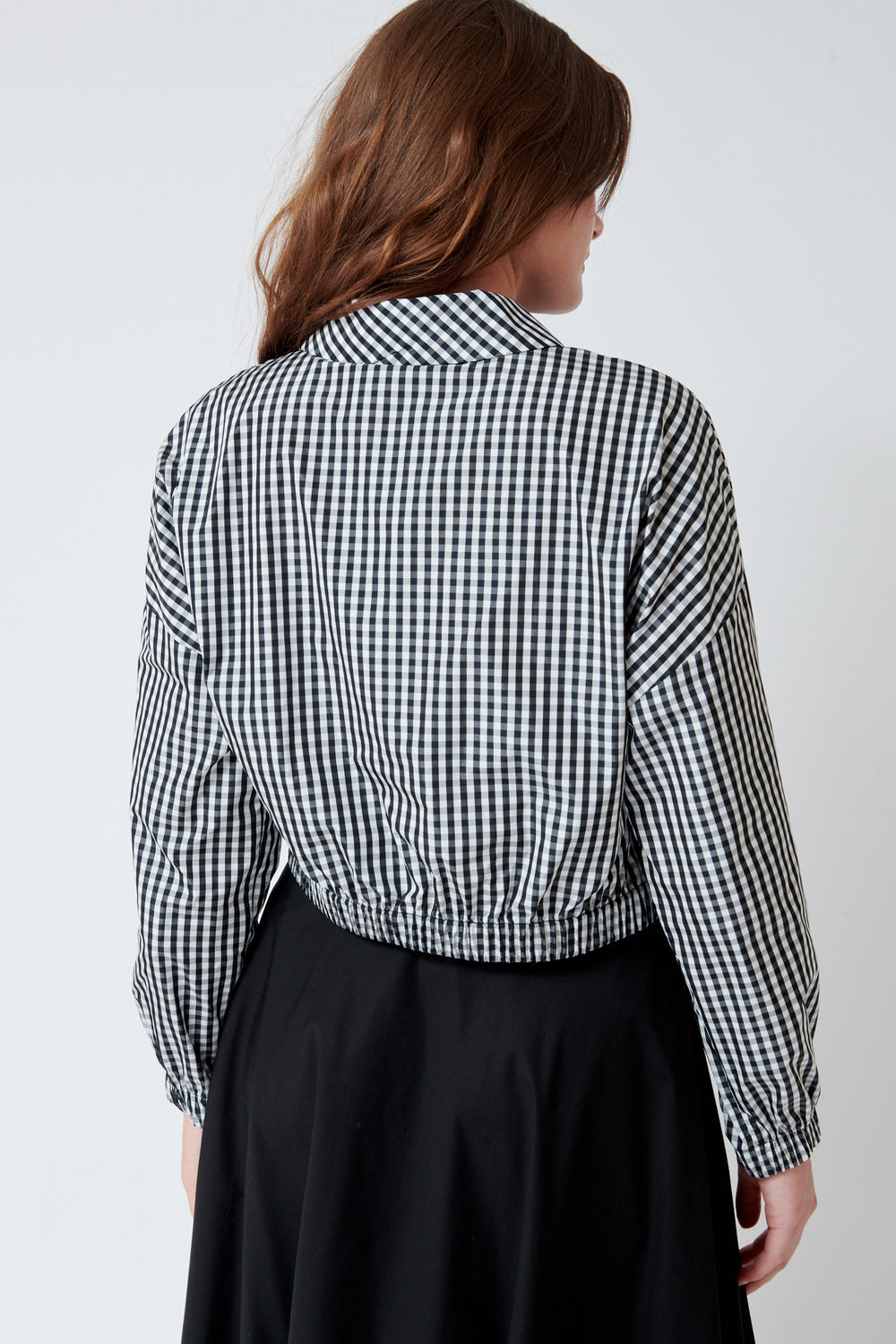 Julia wearing SFIZIO Cropped Gingham Windbreaker rear view