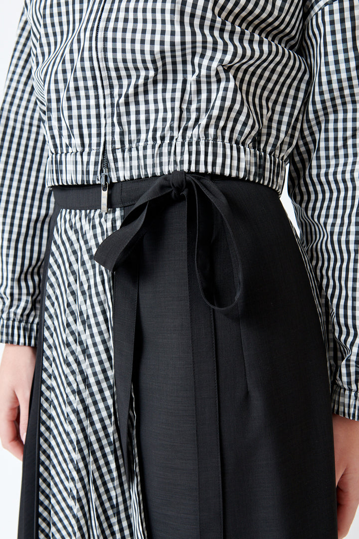 Julia wearing SFIZIO Scalloped Hem Pleated Wrap Skirt front/detail view