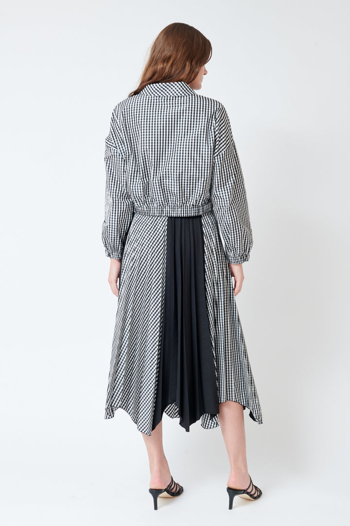 Julia wearing SFIZIO Scalloped Hem Pleated Wrap Skirt rear view