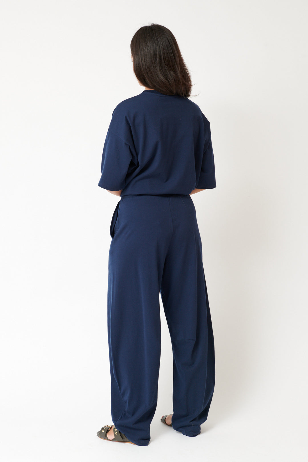 Amanda wearing Jamie Haller The Arc Lounge Pant rear view