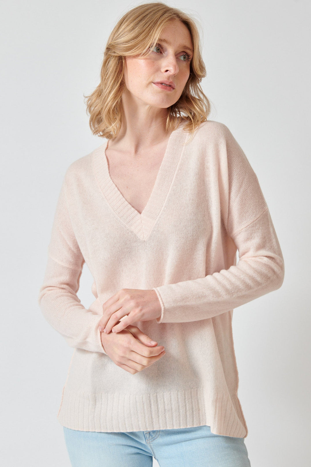 Madi wearing KUJTEN Elena Deep V Sweater front view