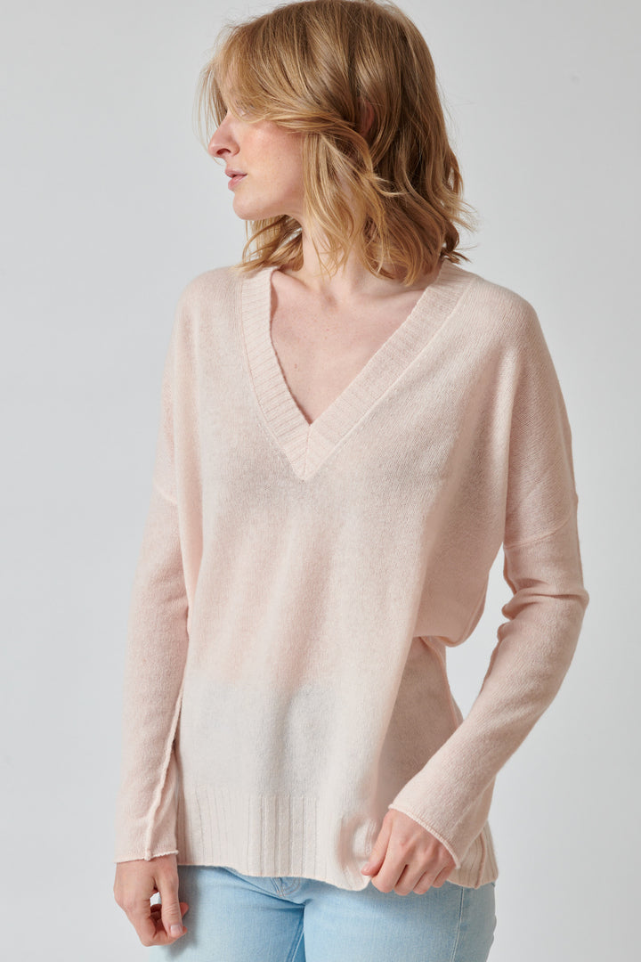 Madi wearing KUJTEN Elena Deep V Sweater front view
