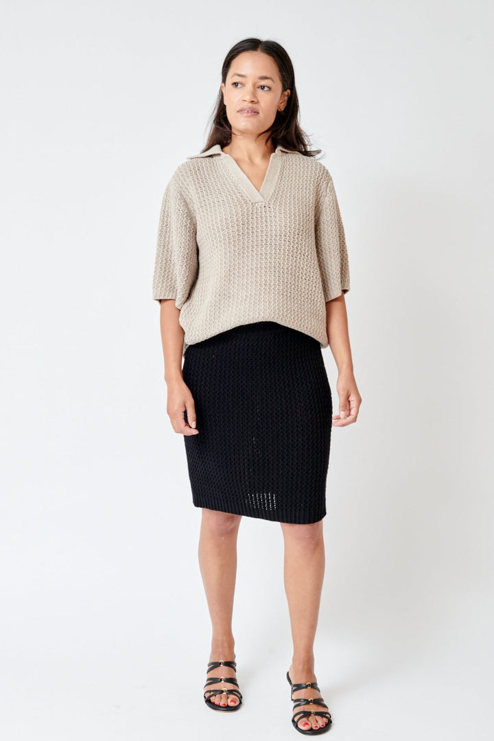 Amanda wearing Lauren Manoogian Rack Mini Skirt front view