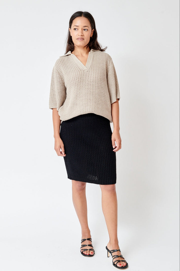 Amanda wearing Lauren Manoogian Rack Mini Skirt front view