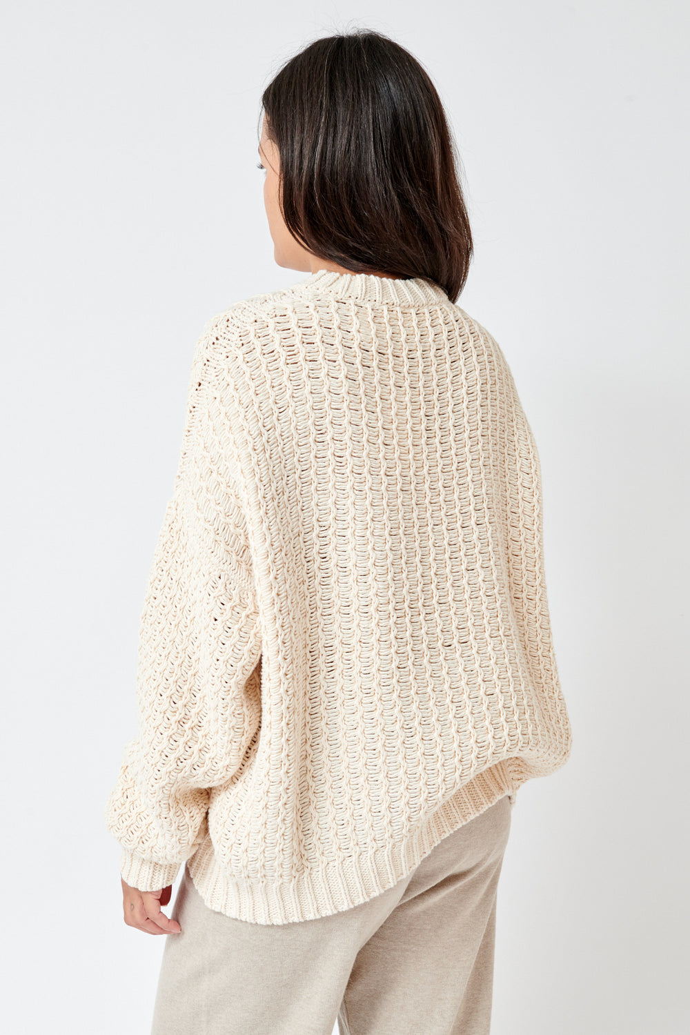 Amanda wearing Rack Crewneck Ivory rear view