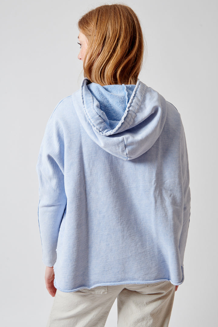 Waverly wearing Frank & Eileen Kane Capelet Hoodie rear view