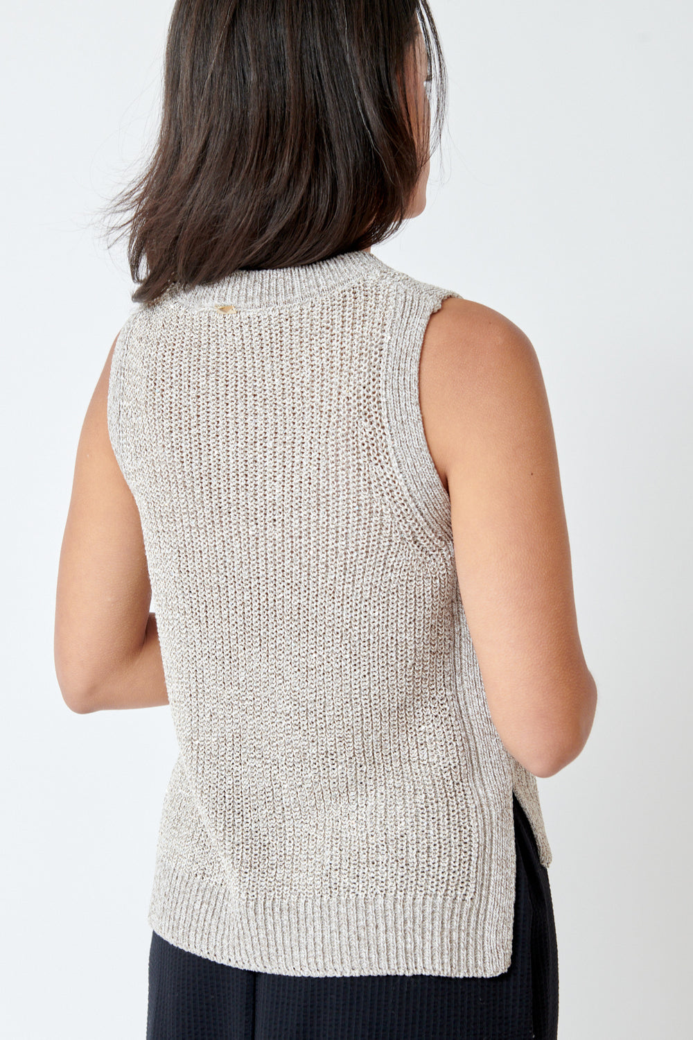 Amanda wearing Herno Sequin Sweater Vest rear view