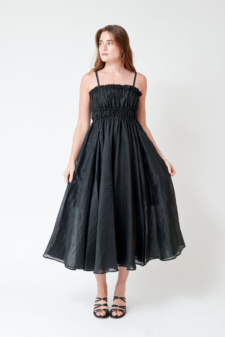 Julia wearing Meimeij Lined Spaghetti Strap Dress With Pockets front view