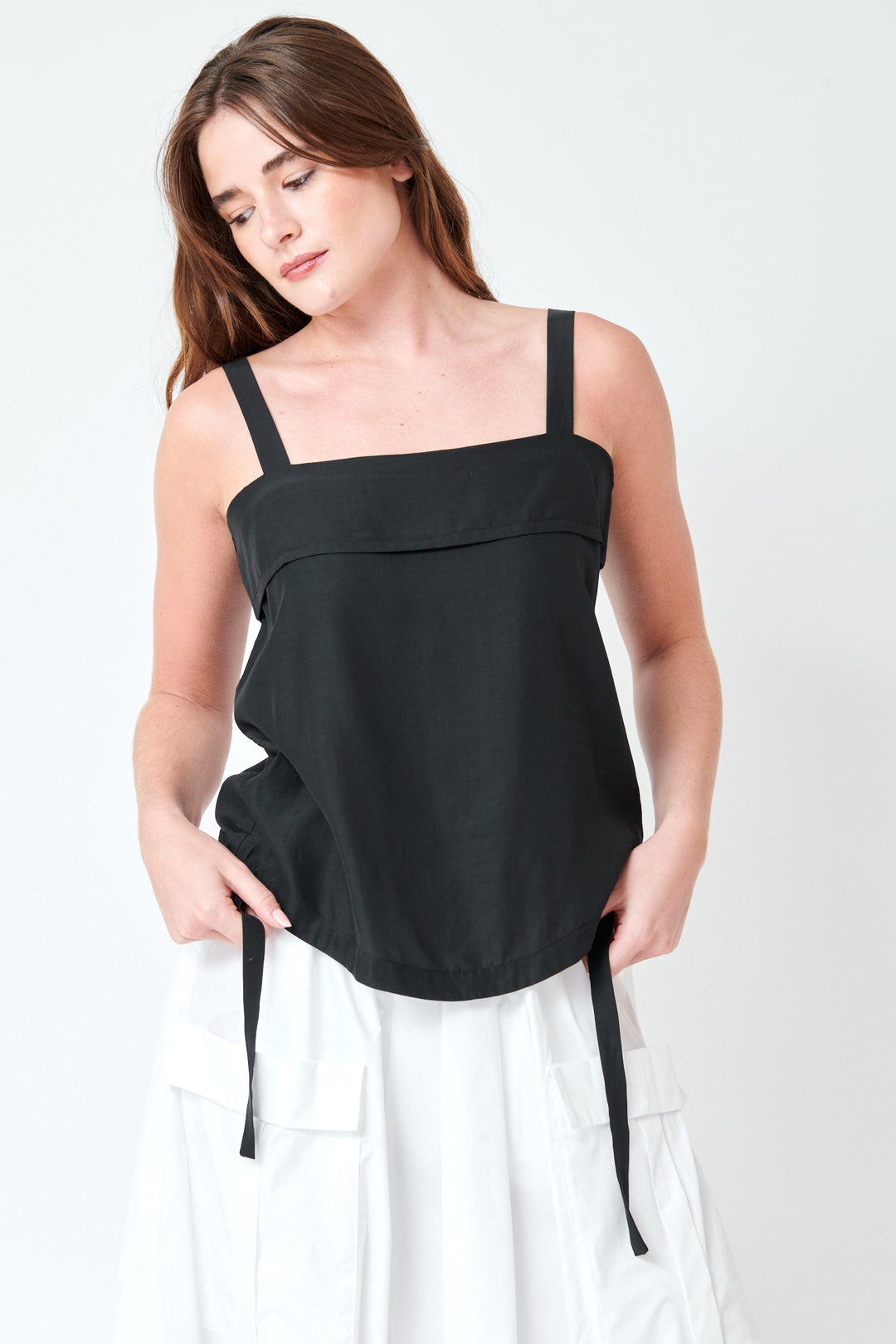 Julia wearing Tela Larry Top front view