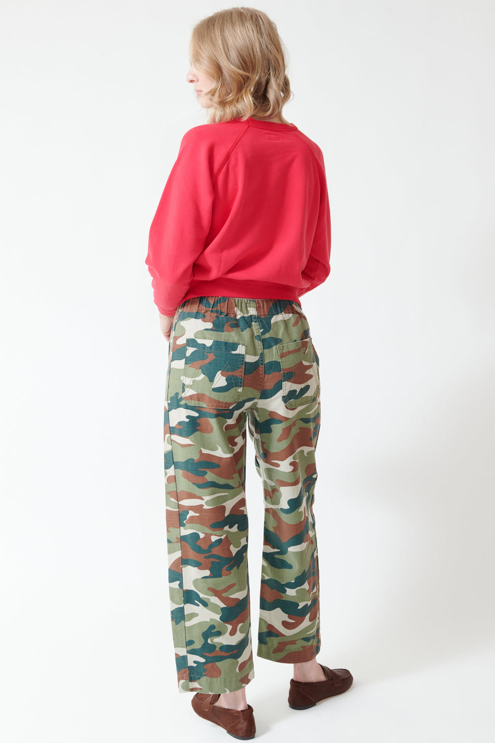 Madi wearing Mother Denim The Drawn Half Pipe Ankle rear view