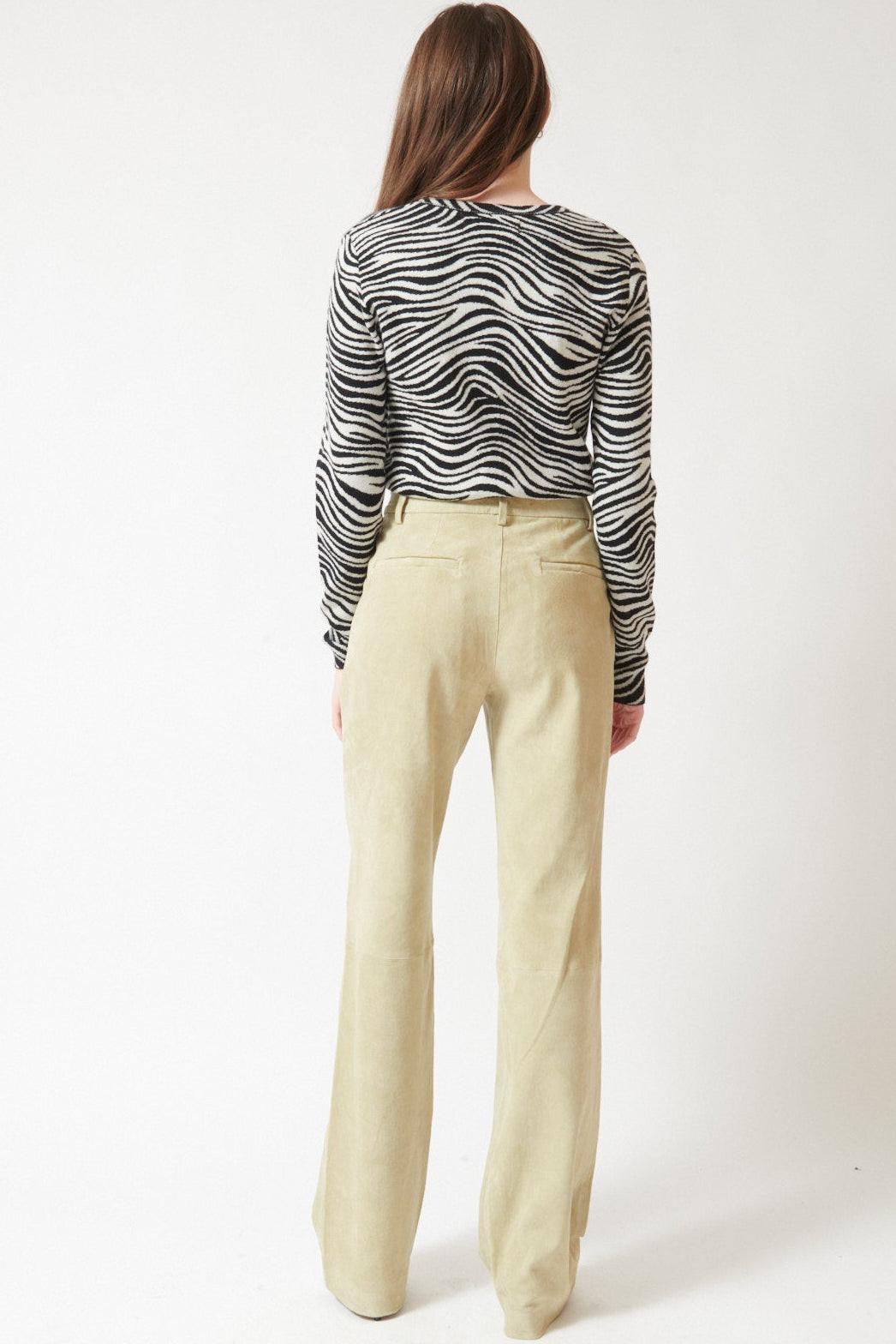 Angela wearing SPRWMN Suede Baggy Lowrise Trousers rear view