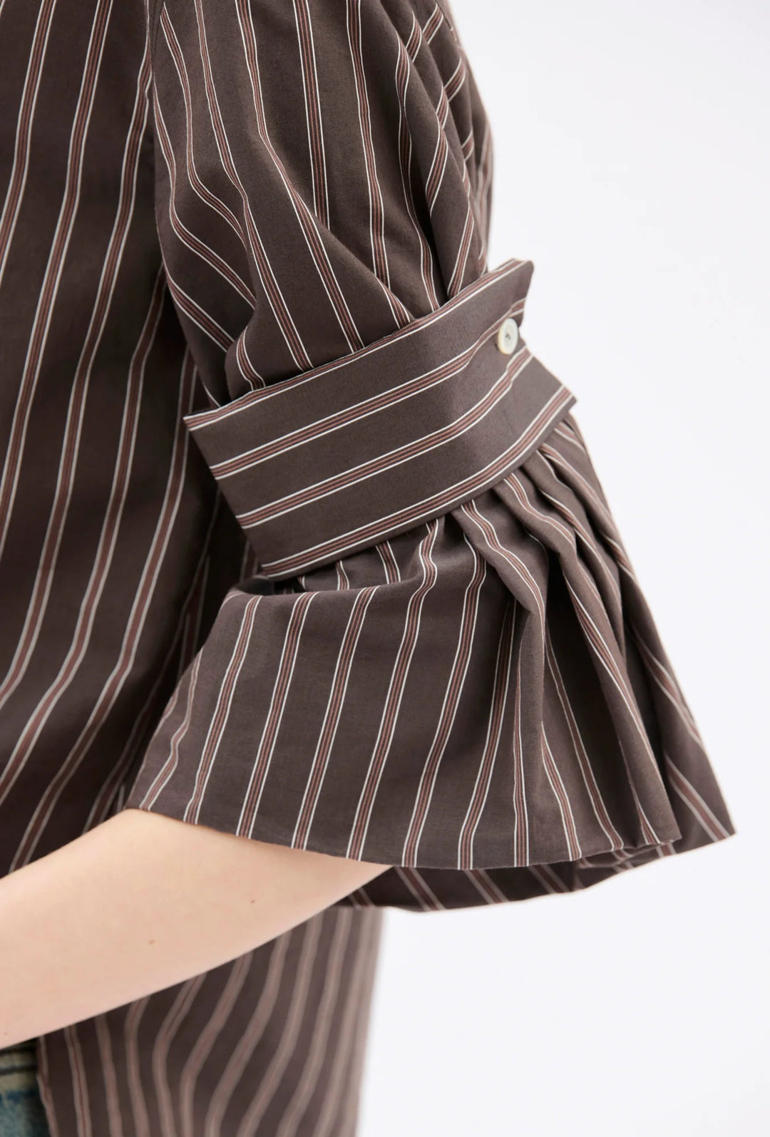 Model wearing Odeeh Mens Stripe Feature Sleeve Shirt Toffee sleeve detail view