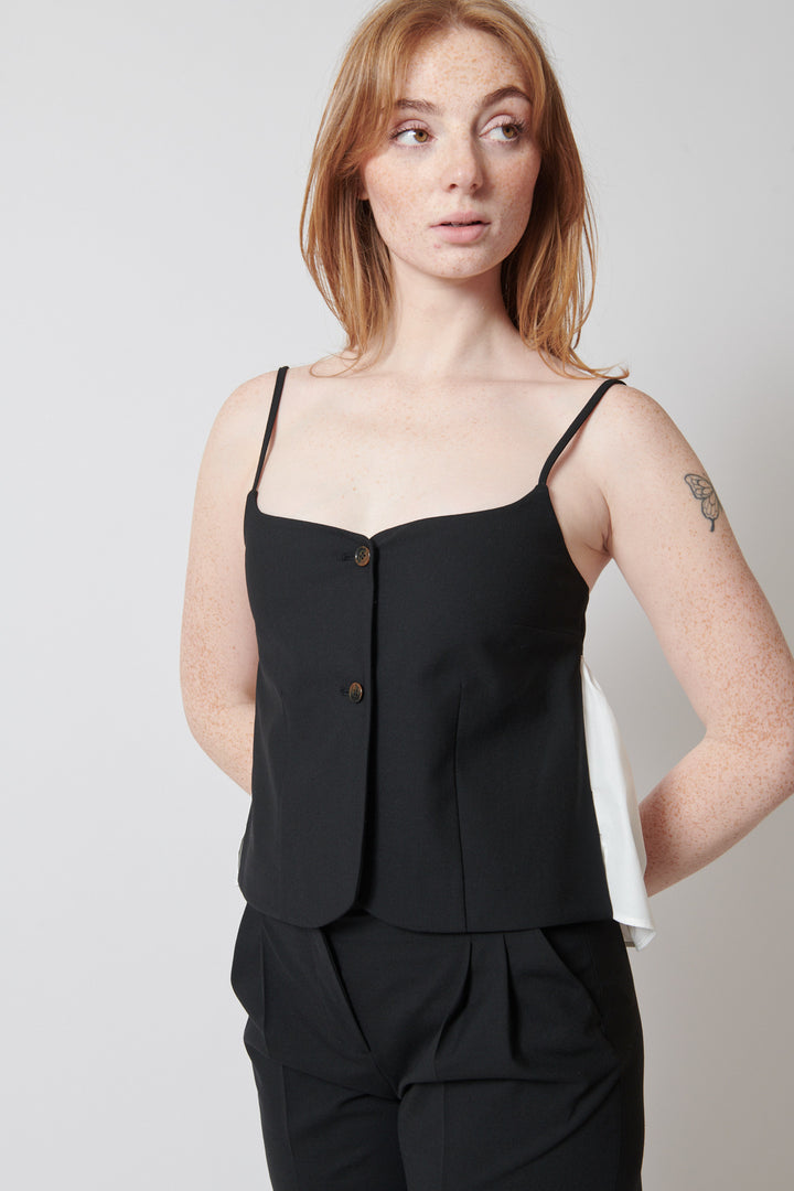 Waverly wearing The Garment Noah Tank Top front view