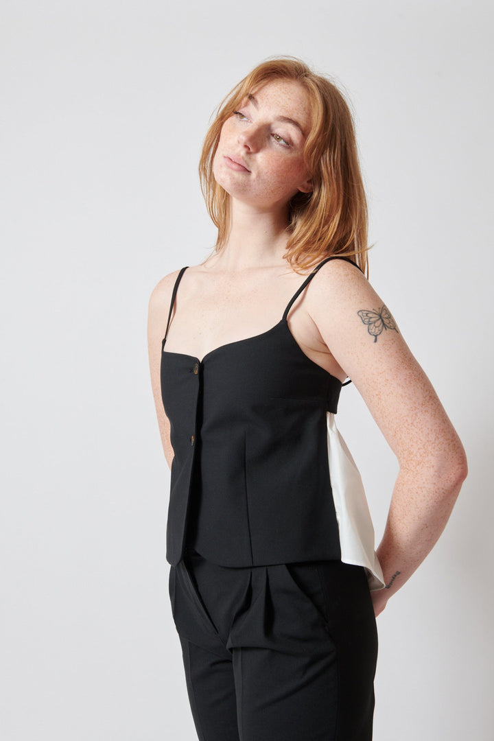 Waverly wearing The Garment Noah Tank Top front view