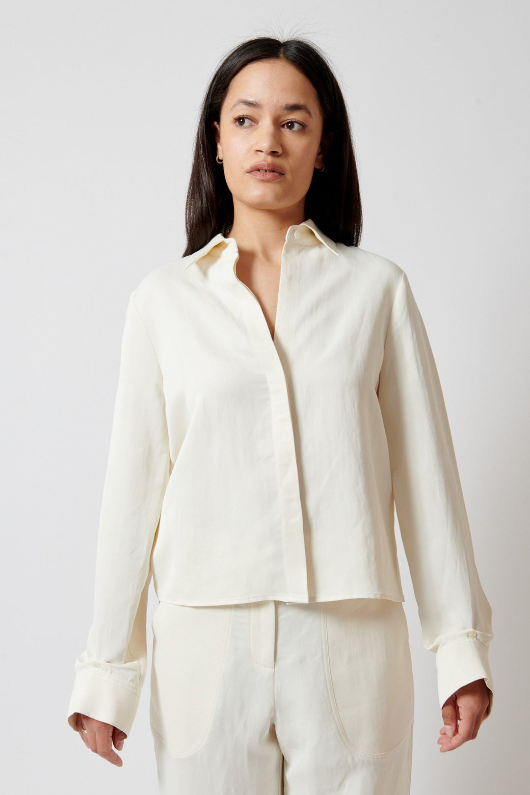 Amanda wearing TWP Button Me Up Blouse front view