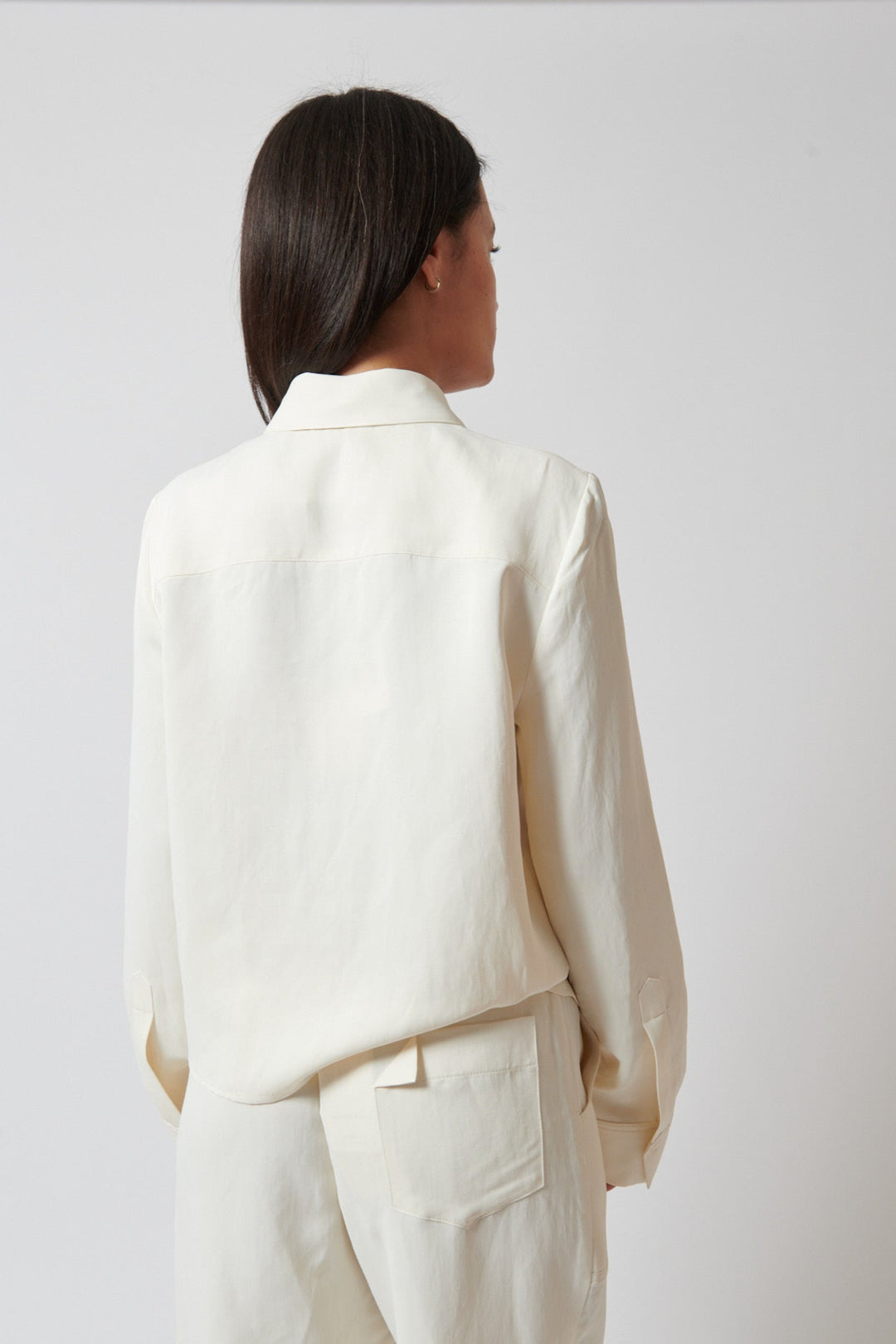 Amanda wearing TWP Button Me Up Blouse rear view