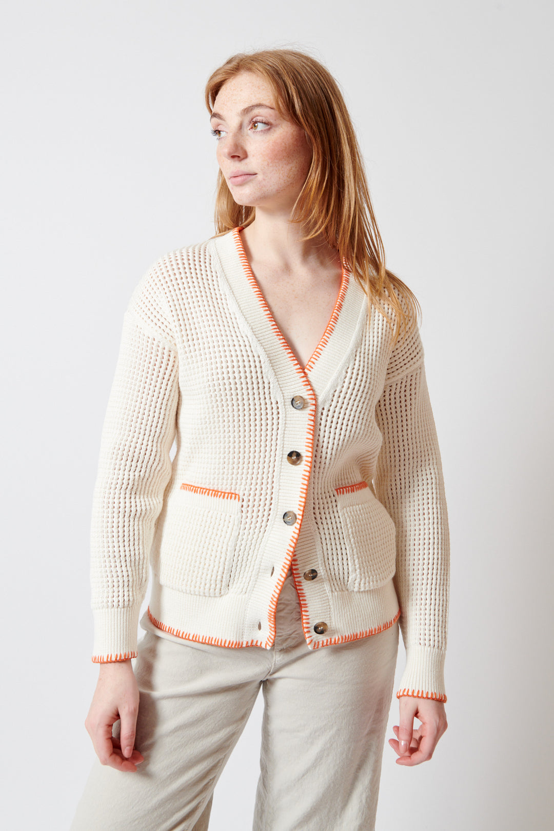 Waverly wearing White + Warren Organic Cotton Blanket Trim Cardigan front view