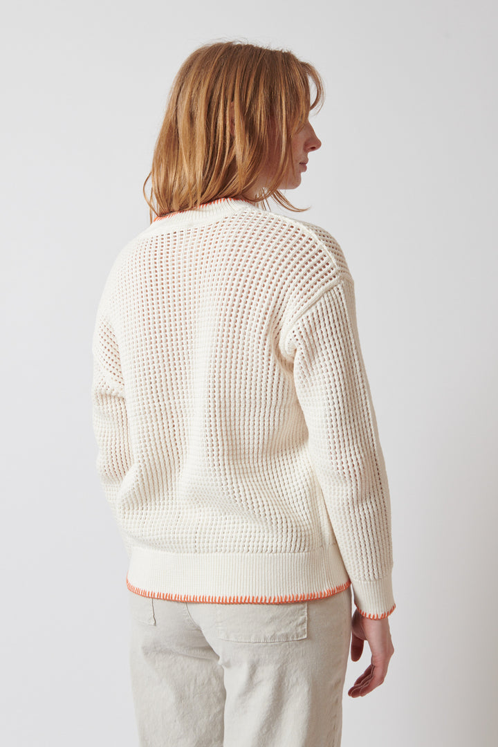 Waverly wearing White + Warren Organic Cotton Blanket Trim Cardigan rear view