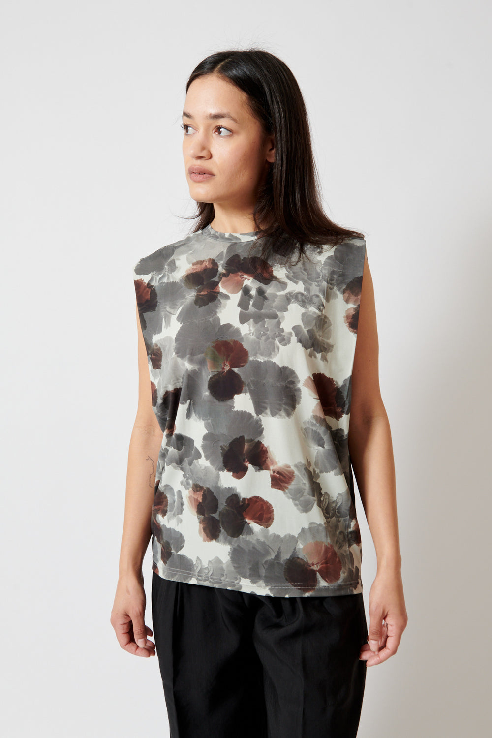 Amanda wearing Christian Wijnants Tabansir Sleeveless Jersey Shoulder Pleat Top front view