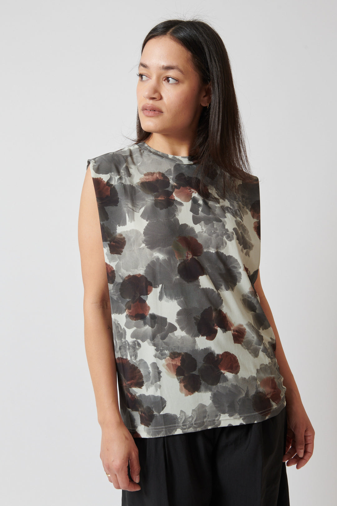 Amanda wearing Christian Wijnants Tabansir Sleeveless Jersey Shoulder Pleat Top front view