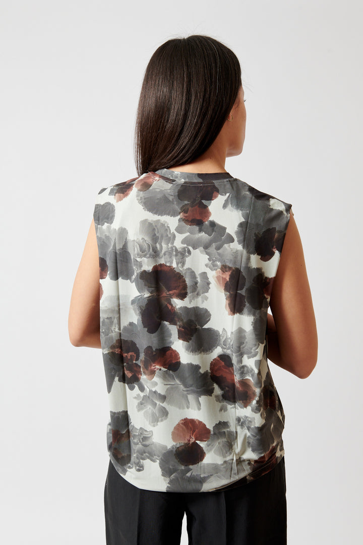 Amanda wearing Christian Wijnants Tabansir Sleeveless Jersey Shoulder Pleat Top rear view