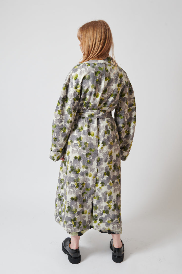 Waverly wearing Christian Wijnants Cumina Quilted Coat With Lapel Collar rear view