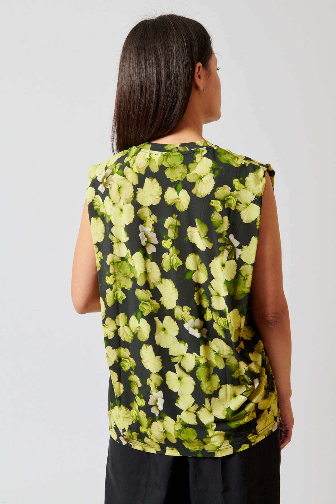 Amanda wearing Christian Wijnants Tabansir Sleeveless Jersey Shoulder Pleat Top rear view