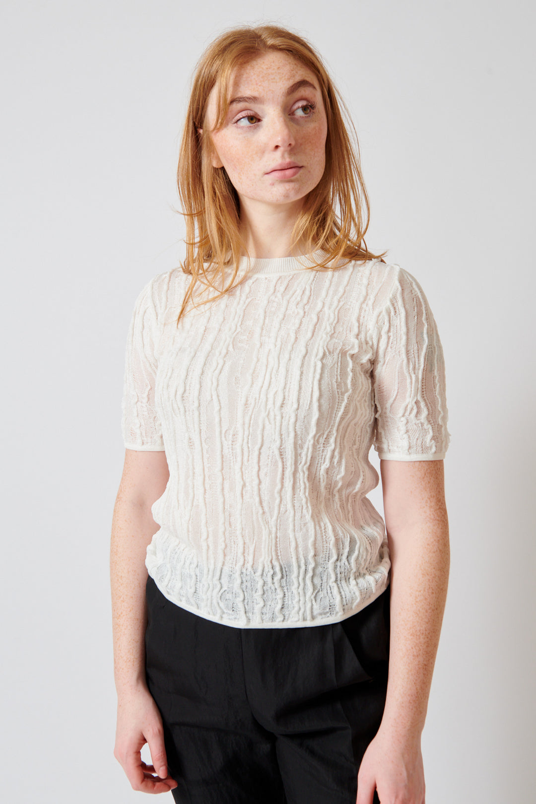 Waverly wearing Christian Wijnants Kibo Knitted Top With Short Sleeves In Textured Stitch front view