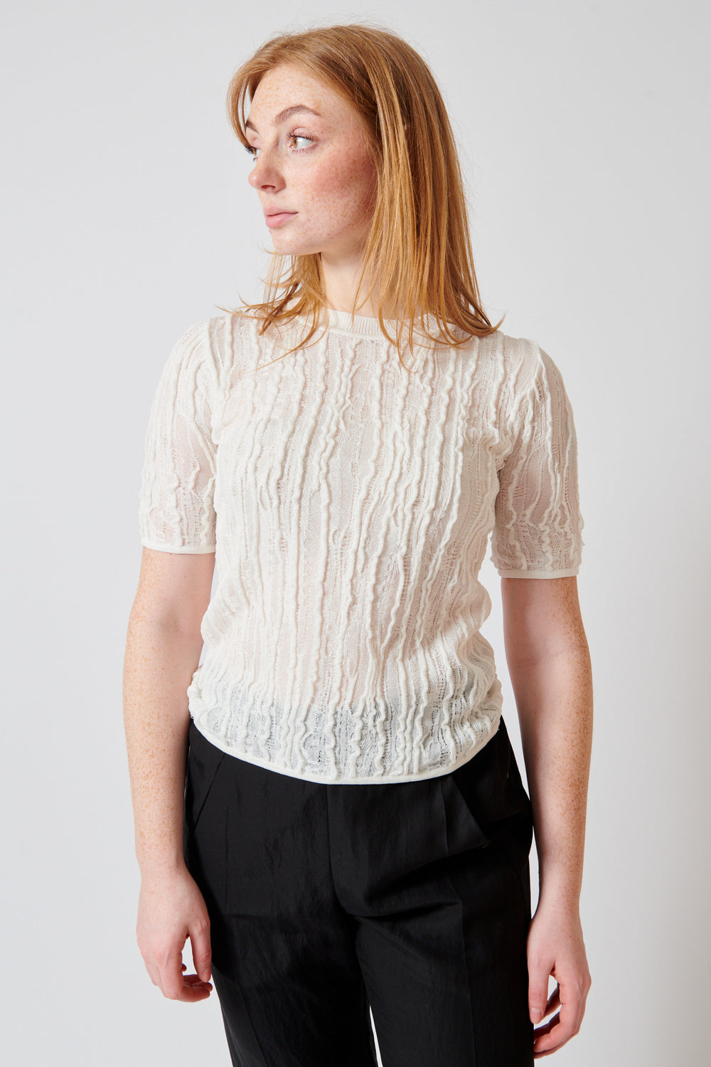 Waverly wearing Christian Wijnants Kibo Knitted Top With Short Sleeves In Textured Stitch front view
