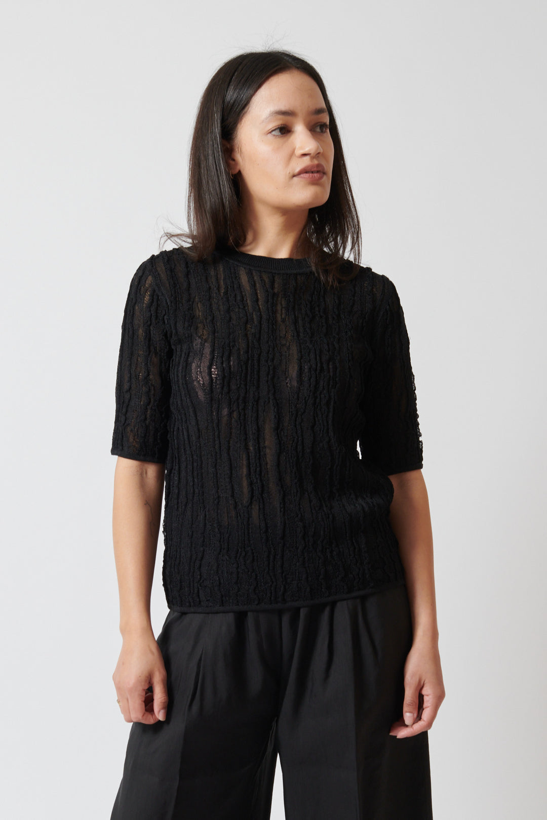 Amanda wearing Christian Wijnants Kibo Knitted Top With Short Sleeves In Textured Stitch front view