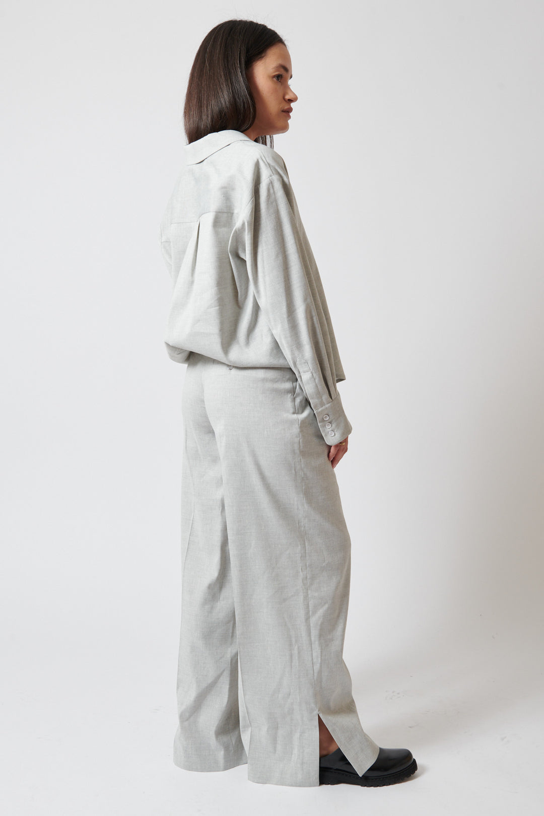 Amanda wearing The Garment Gabriel Wide Pants rear/side view