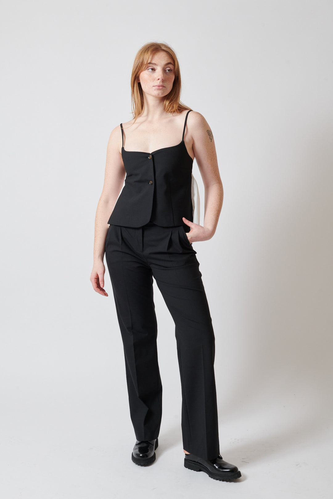 Waverly wearing The Garment Noah Pants front view